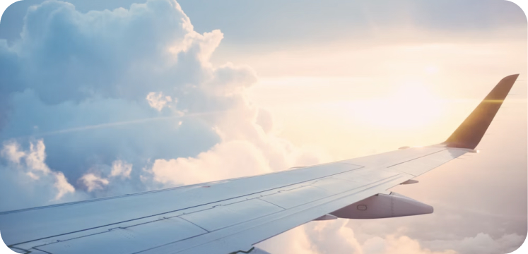 Airplane wing above the clouds
